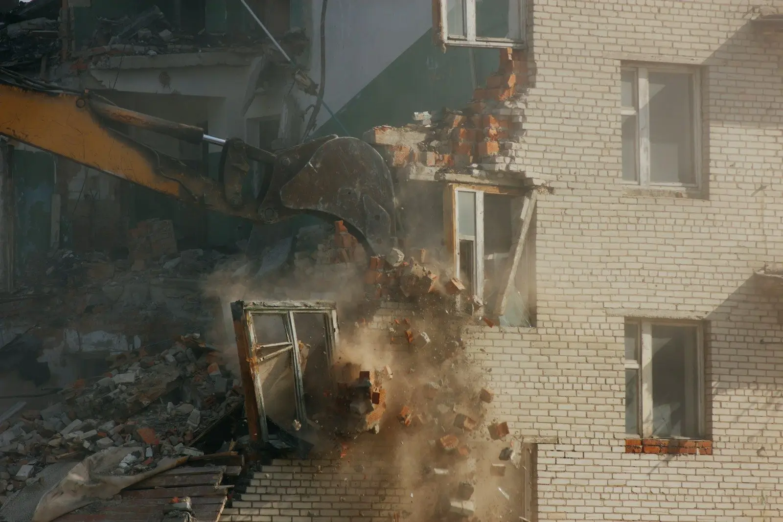 Controlled demolition work with debris and equipment