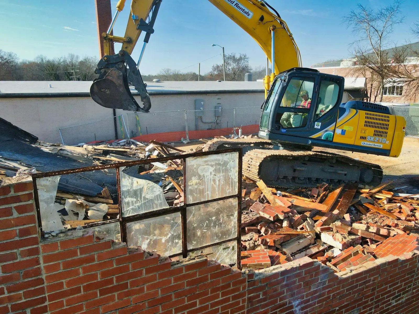 Demolition equipment working on a Riverside structure