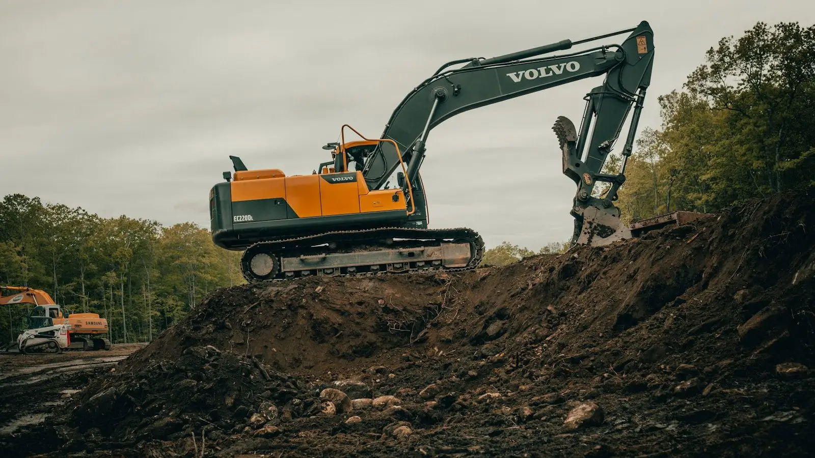 Excavator preparing a construction site