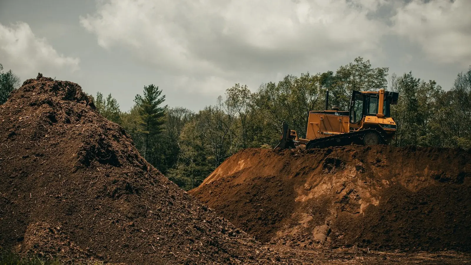Excavation equipment digging and grading soil